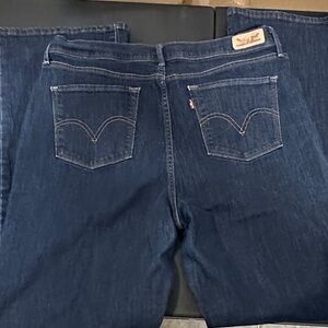 614.  Levi's women’s  Dark Blue 512 bootcut Jeans size 34 actual waist measure